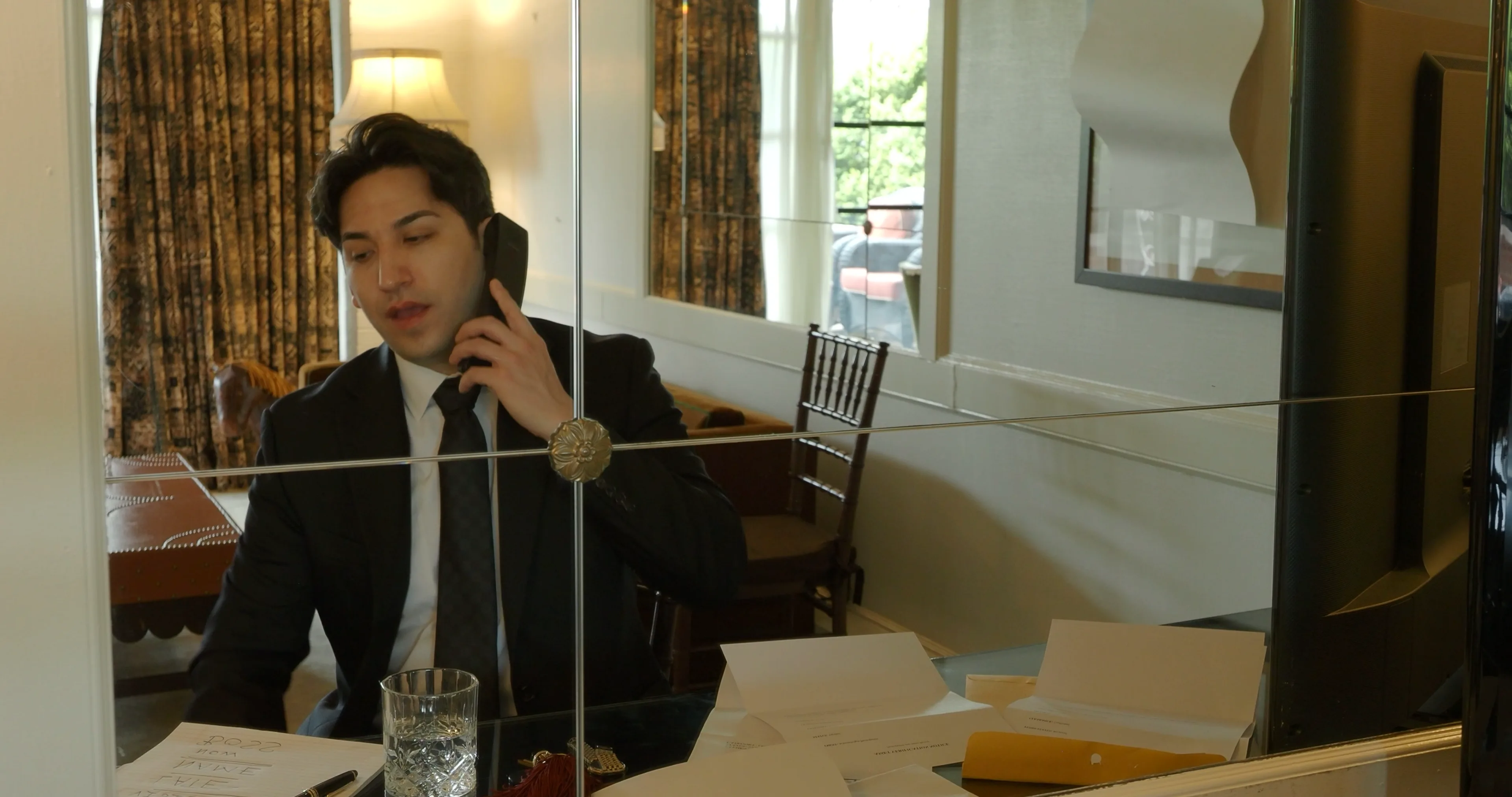 Ian Bloom as The Gangster in Big Time at the hotel room phone