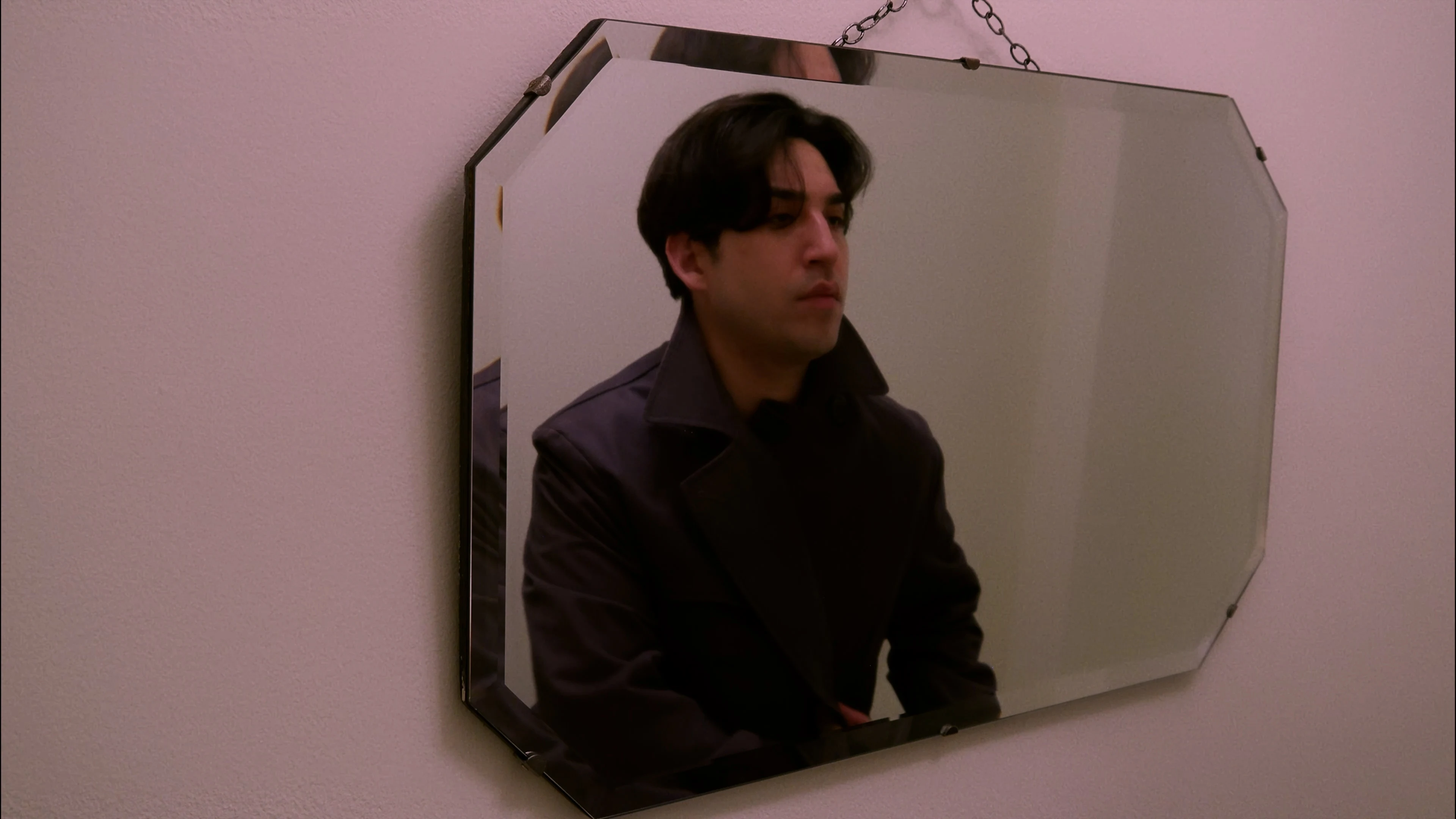 Ian Bloom in King walking across a garage roof at sunset in Los Angeles